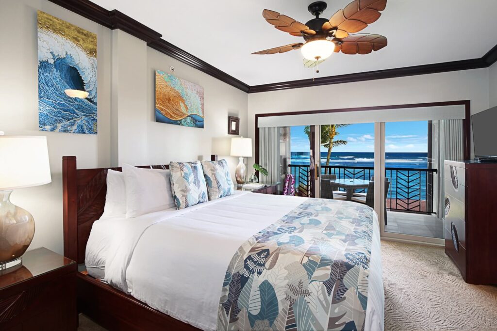 The bedroom at one of the luxury Kauai Oceanfront rentals from Kauai Exclusive Management.