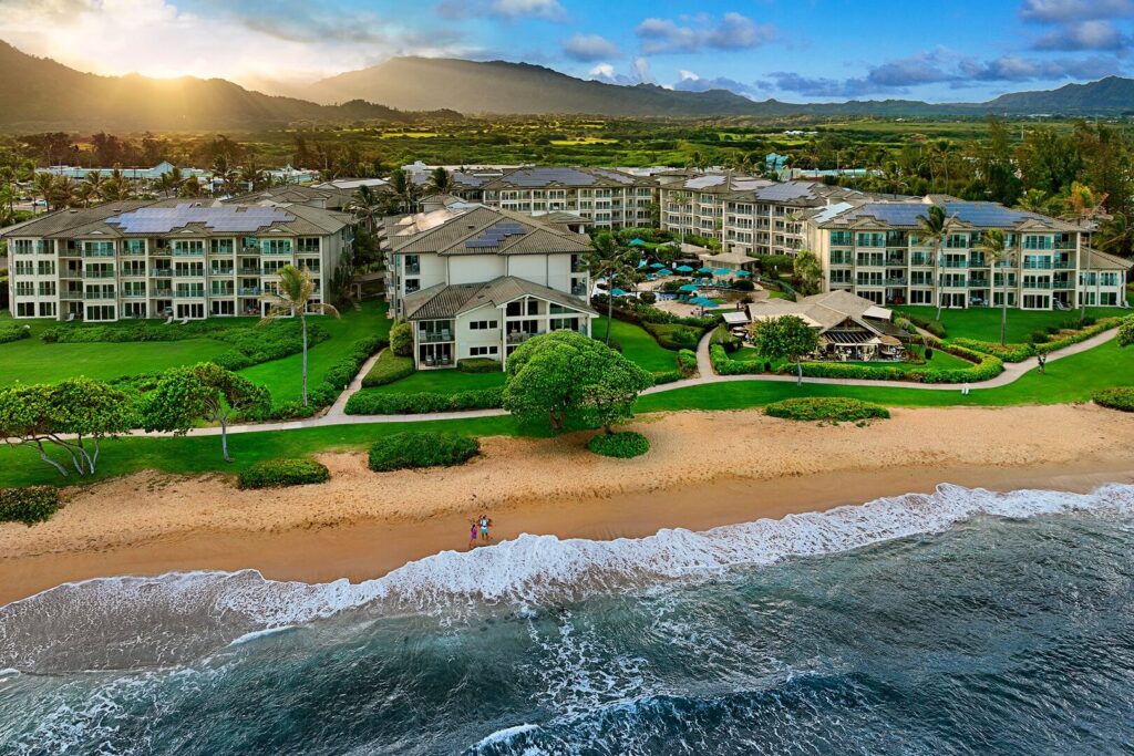 An aerial view of Kauai oceanfront rentals close to the beach.