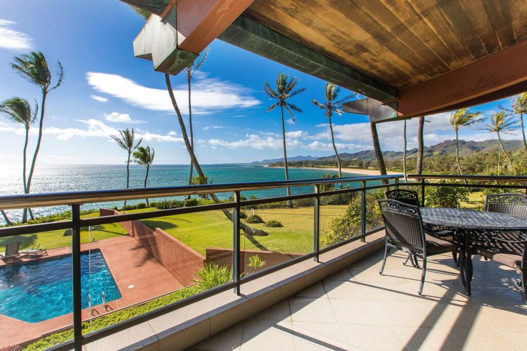 The view from a lanai of one of the Kauai rentals at an oceanfront resort.