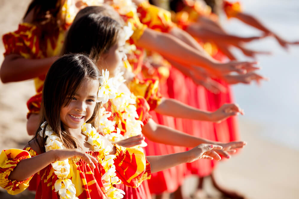 A group of young girls dancing at the Kauai Mokihana Festival.