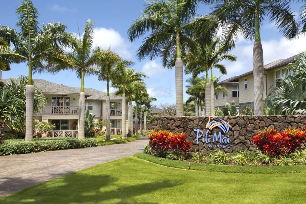 The sign and front entrance of Pili Mai, one of the top resorts on Kauai.